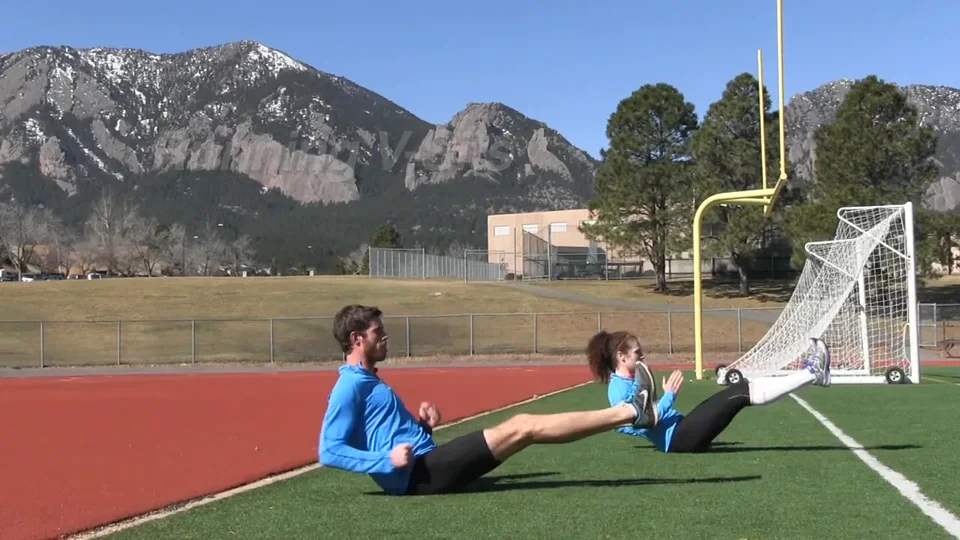 Macklin and Nikki demonstrating running V-sits